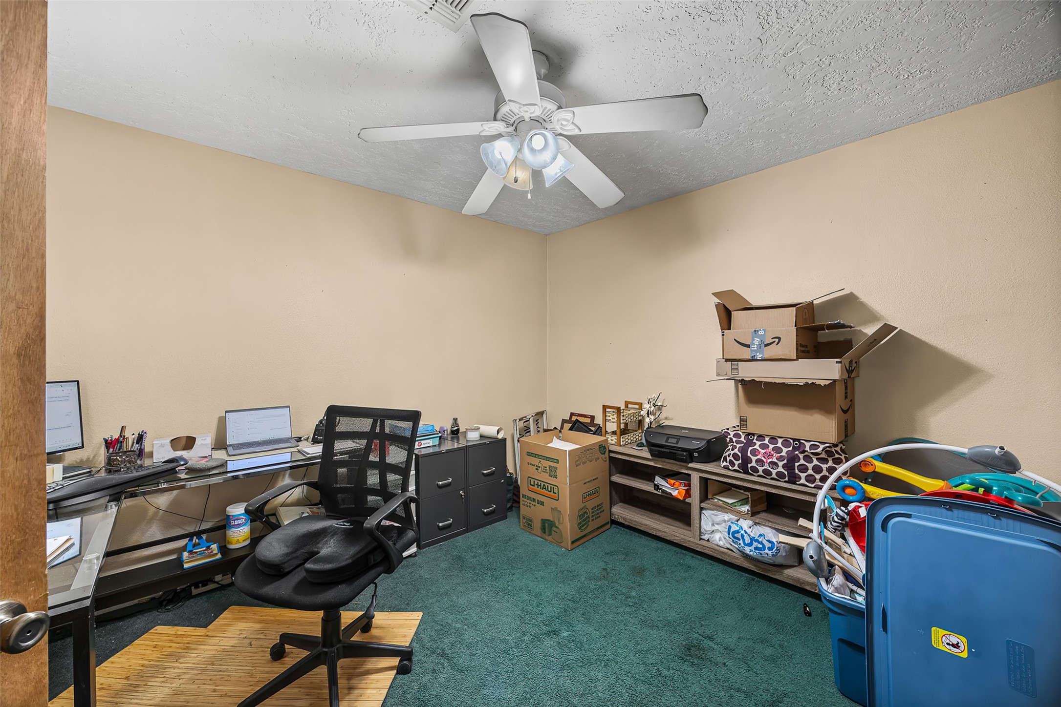 2519 Wood River Road Spring, TX 77373 - Photo 6 of 26 a view of a workspace with furniture and toys