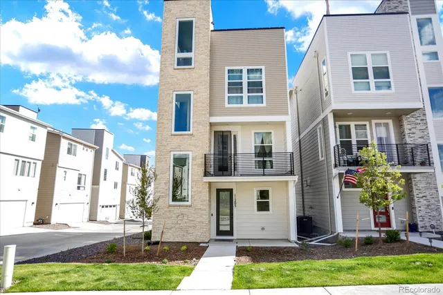 a front view of house with yard