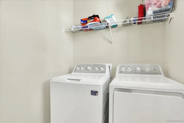 a utility room with dryer and washer