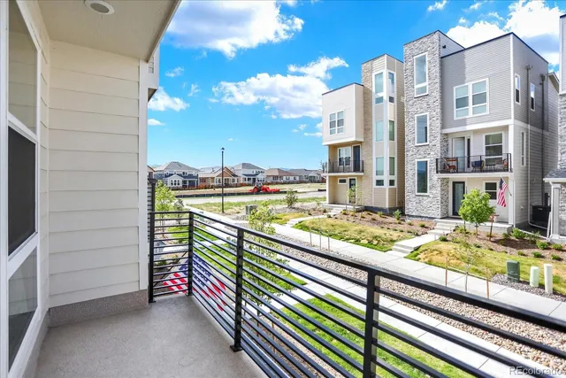 a view of buildings from the balcony