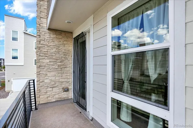 a view of a door and chair in the room