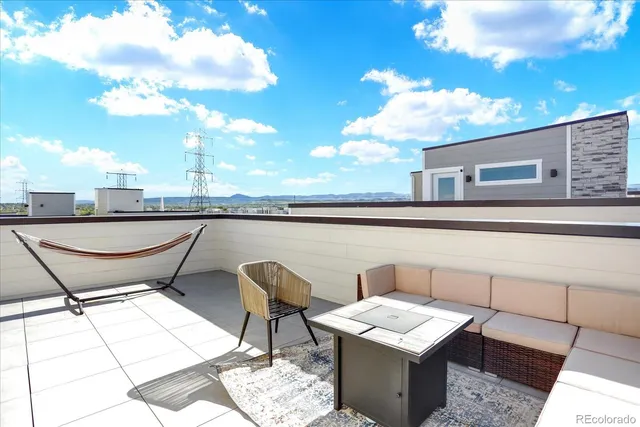 a view of a terrace with furniture