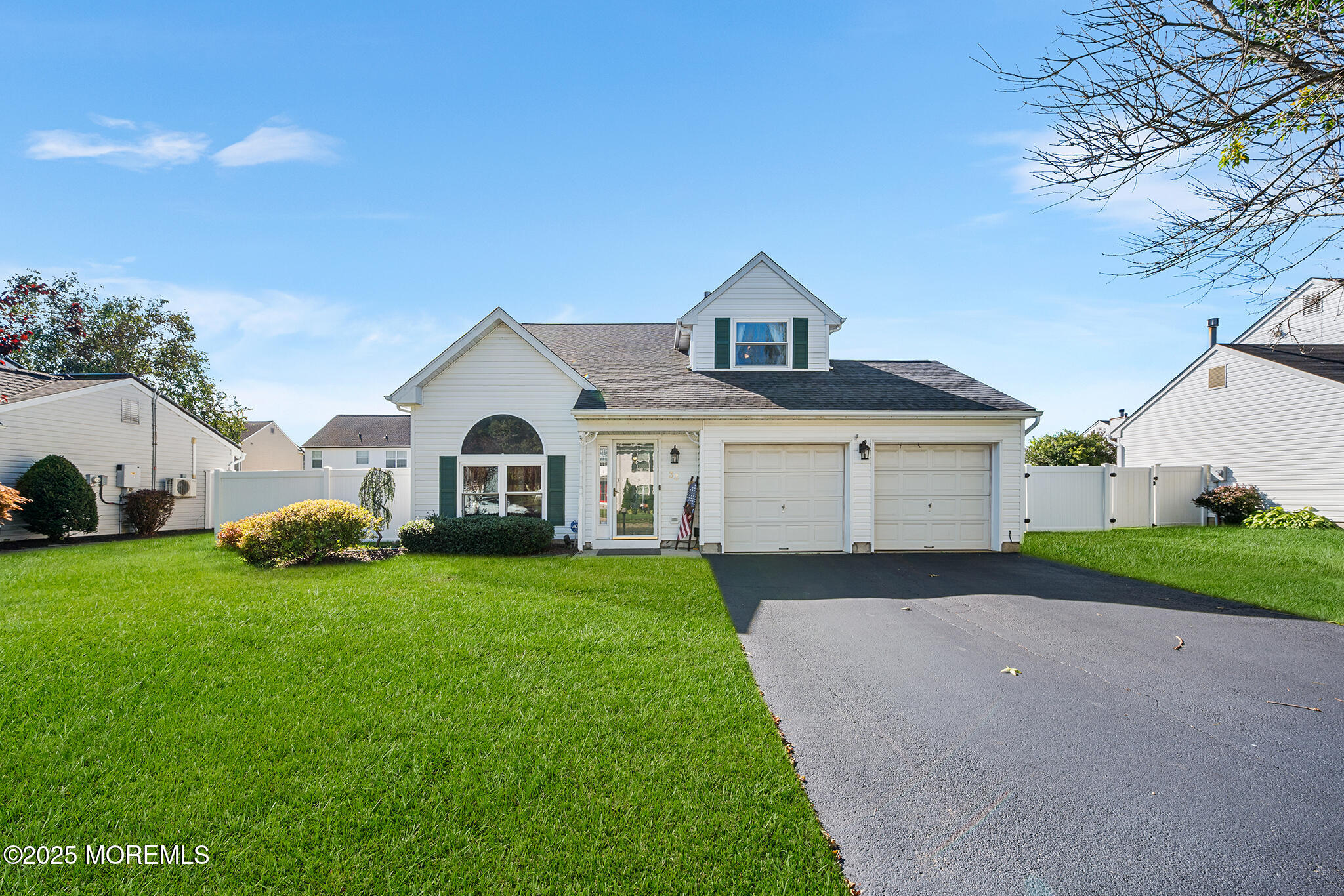 33 Bryce Canyon Road Howell, NJ 07731 - Photo 2 of 44 a front view of a house with a yard and garage