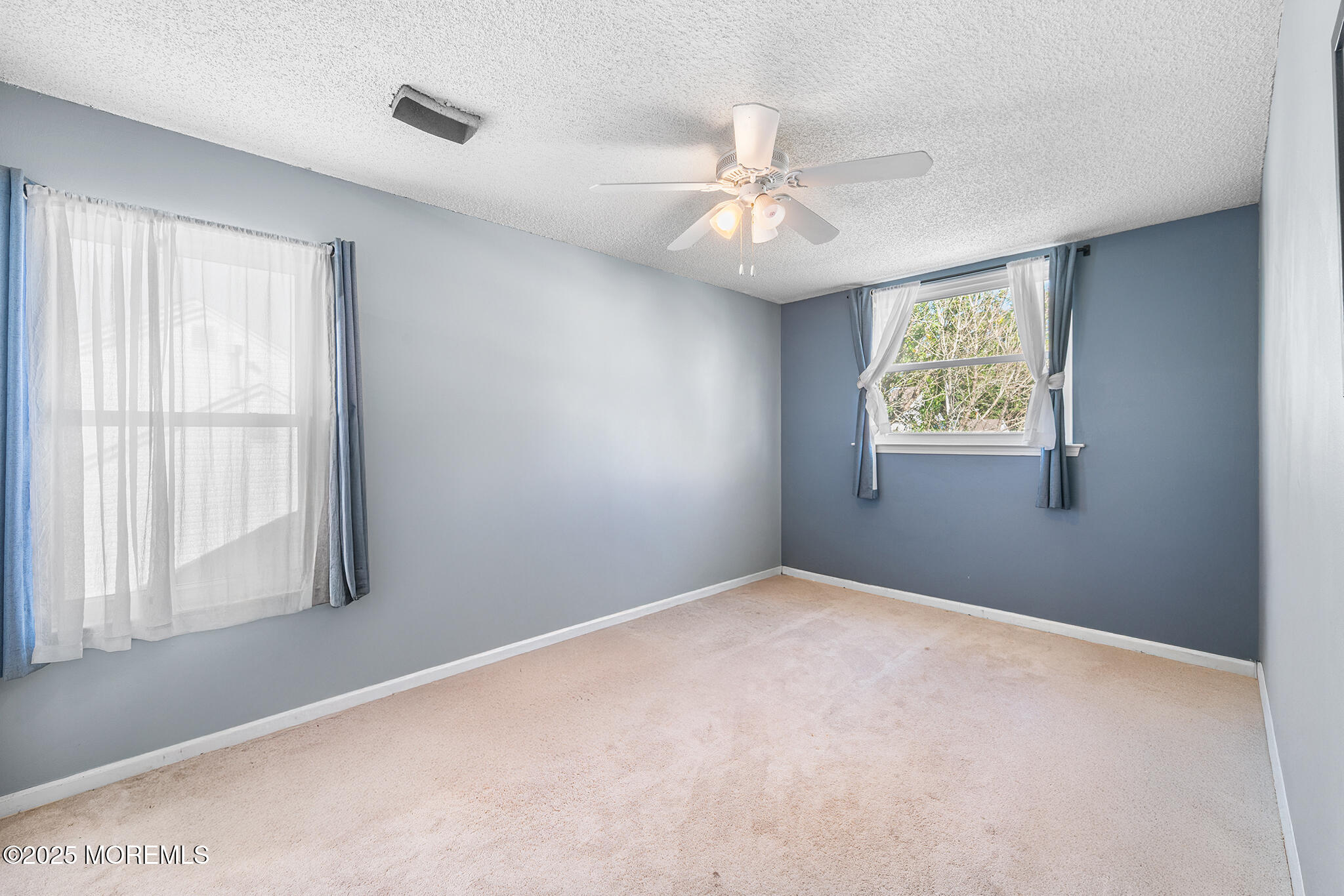 33 Bryce Canyon Road Howell, NJ 07731 - Photo 24 of 44 a view of an empty room with a window