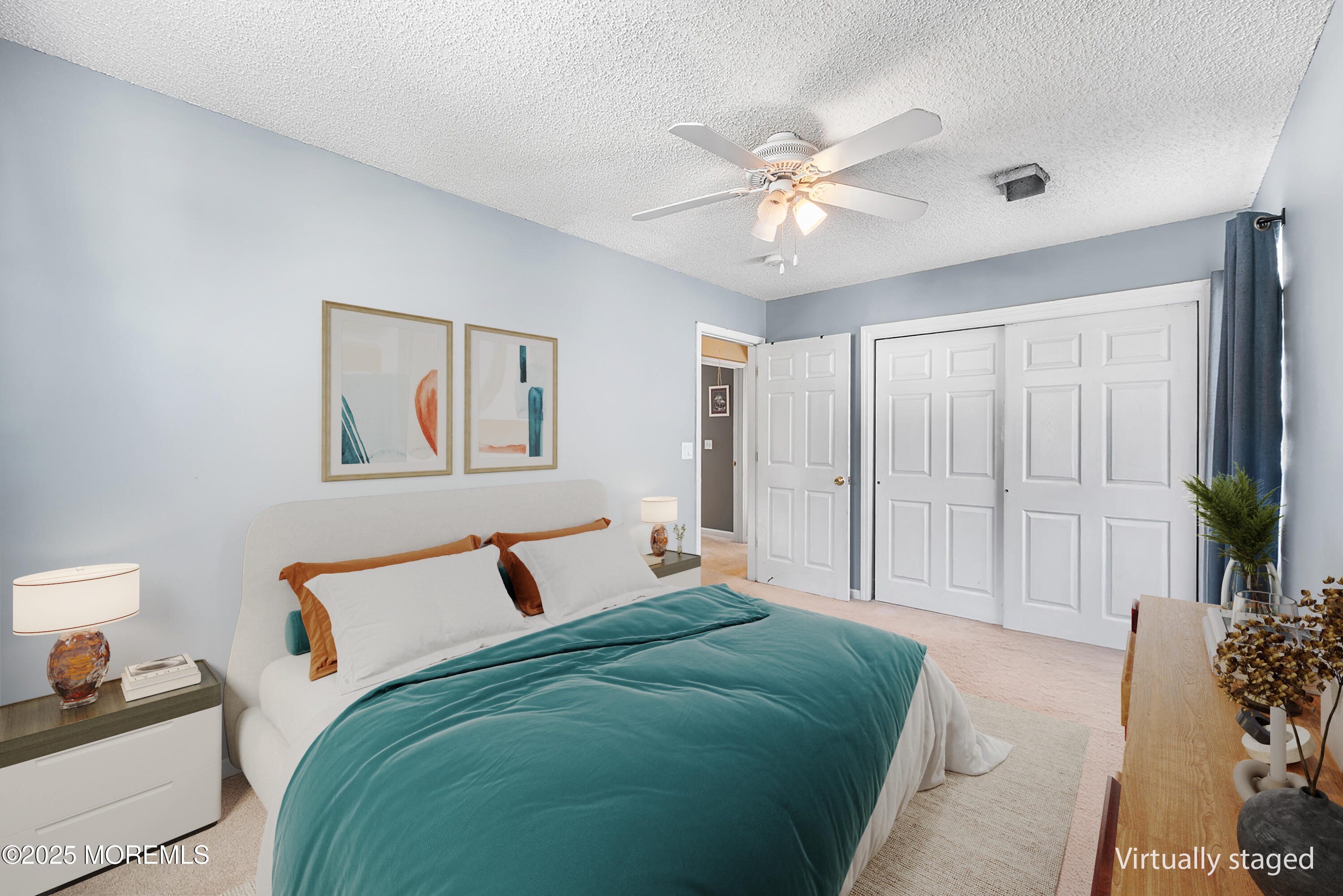 33 Bryce Canyon Road Howell, NJ 07731 - Photo 25 of 44 a bedroom with a large bed and a chandelier