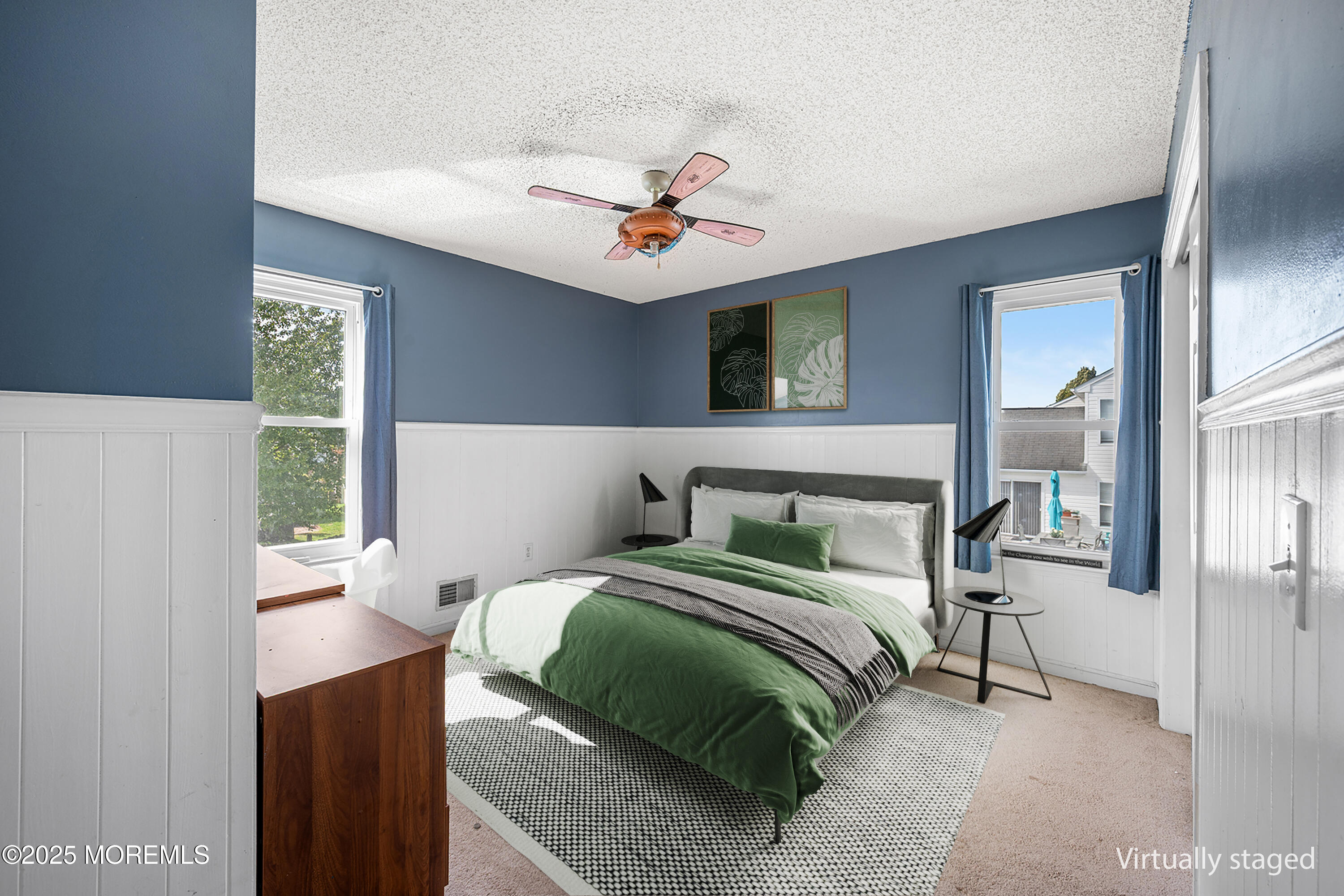 33 Bryce Canyon Road Howell, NJ 07731 - Photo 29 of 44 a bedroom with a bed and a chandelier