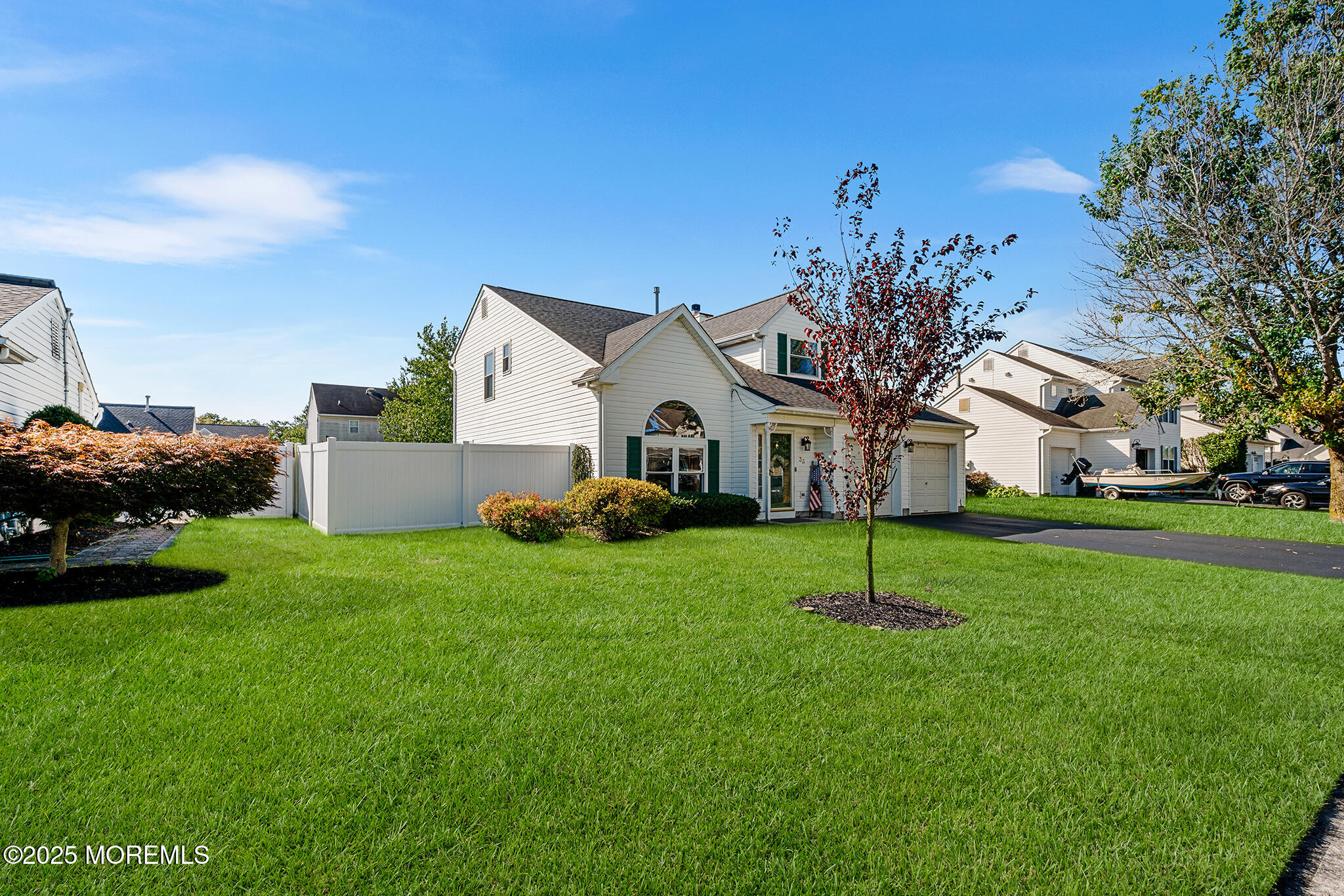 33 Bryce Canyon Road Howell, NJ 07731 - Photo 3 of 44 a house with green field in front of it