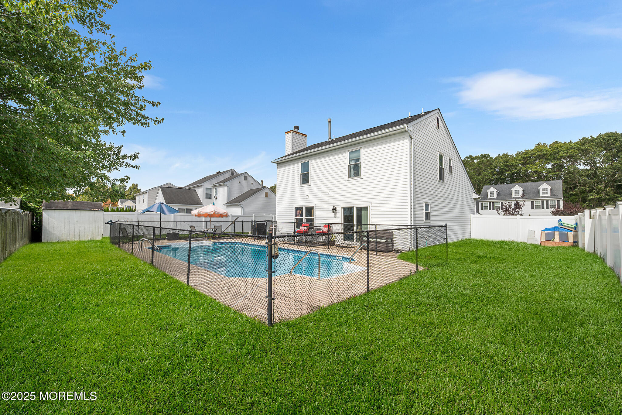 33 Bryce Canyon Road Howell, NJ 07731 - Photo 38 of 44 a view of a house with a yard and sitting area