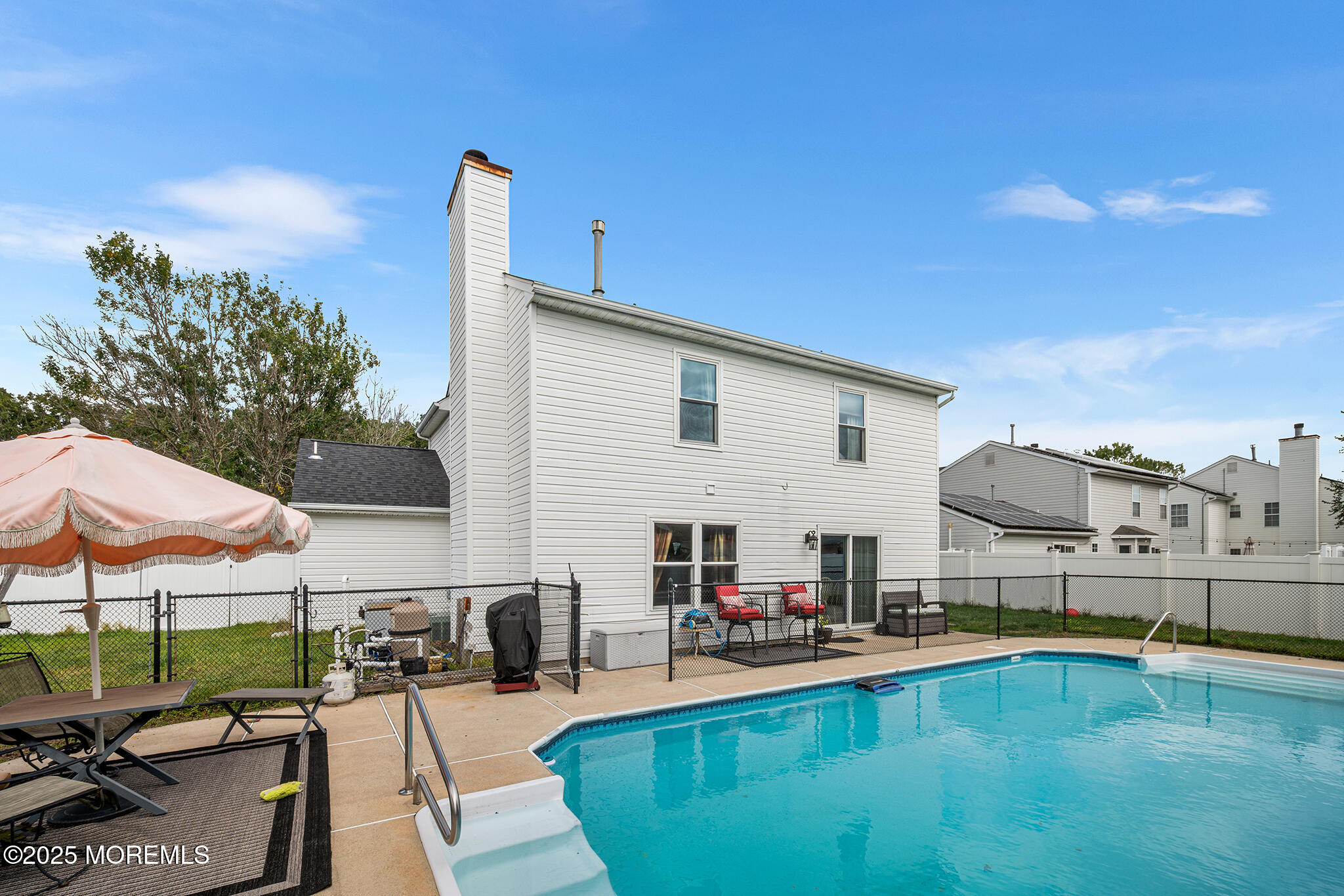 33 Bryce Canyon Road Howell, NJ 07731 - Photo 41 of 44 a view of a swimming pool with a lounge chairs