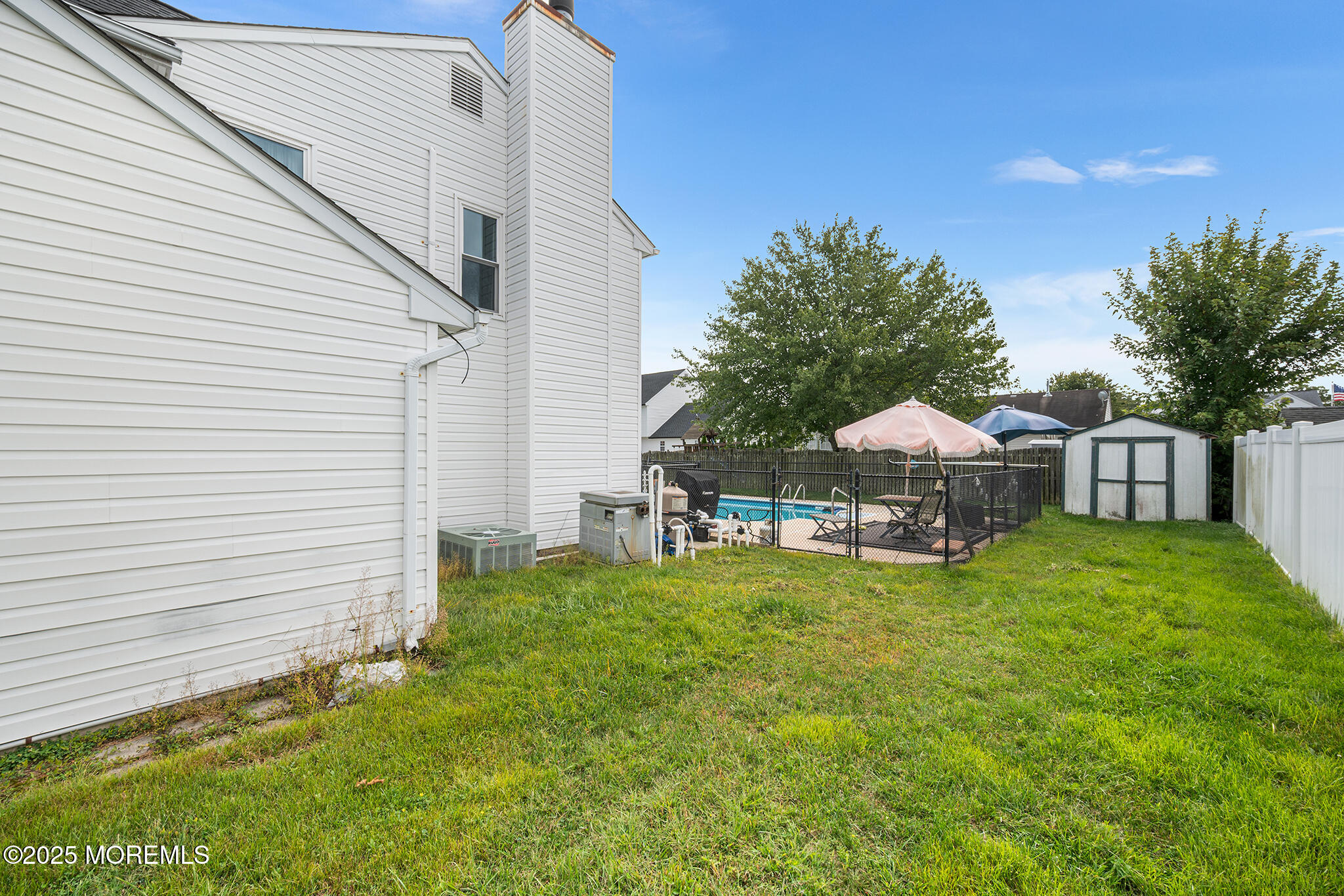 33 Bryce Canyon Road Howell, NJ 07731 - Photo 42 of 44 a view of a house with backyard and sitting area