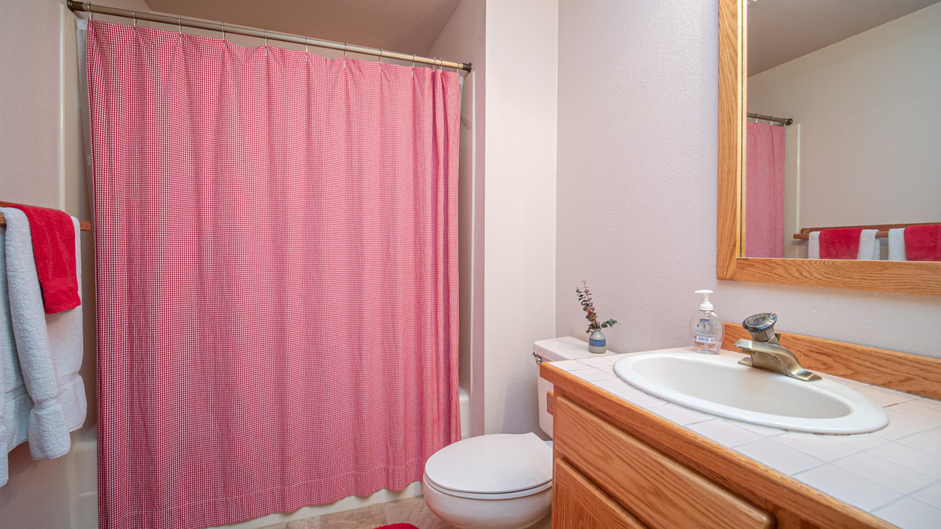 17932 Rhododendron Lane Sunriver, OR 97707 - Photo 23 of 32 The downstairs bath is clean and simple.