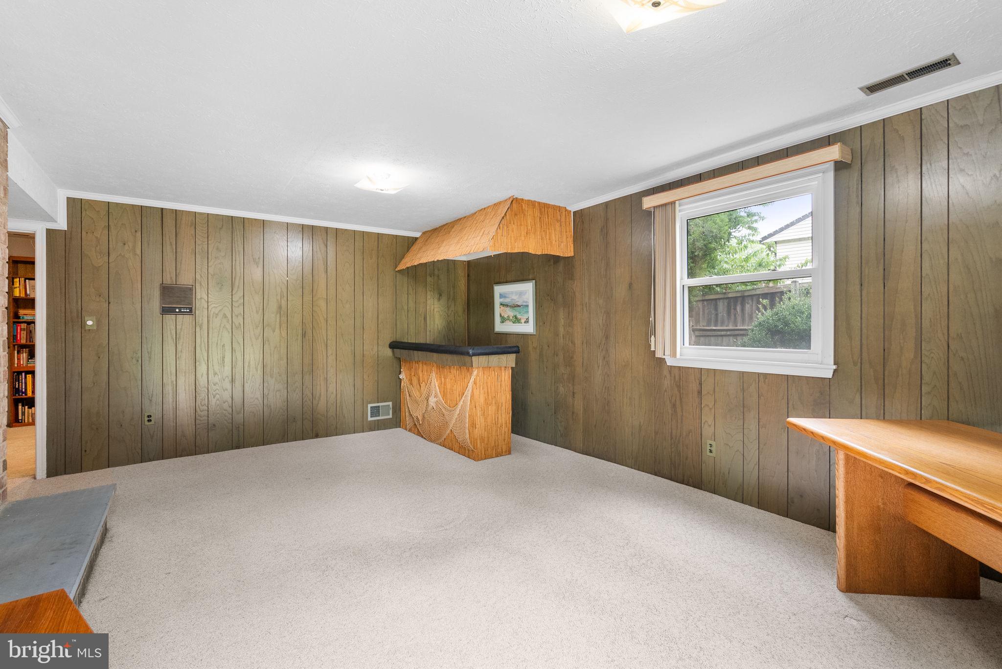 4004 Briars Road Olney, MD 20832 - Photo 29 of 46 a view of an empty room with a window
