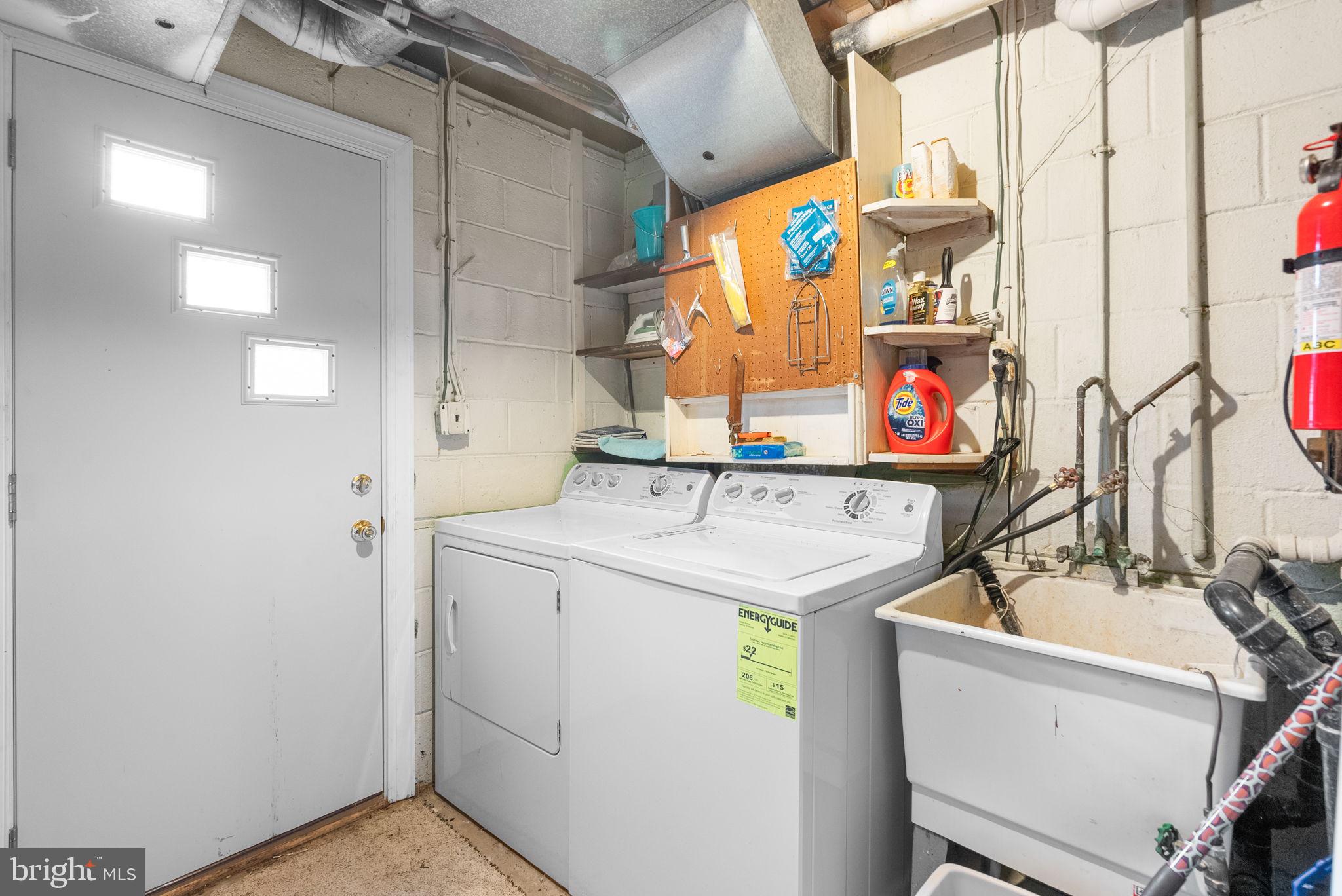 4004 Briars Road Olney, MD 20832 - Photo 45 of 46 a utility room with dryer and washer