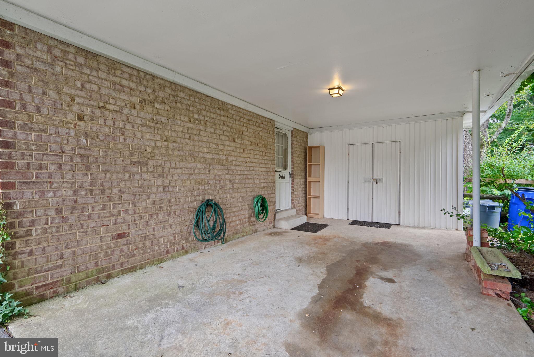 4004 Briars Road Olney, MD 20832 - Photo 46 of 46 a view of an empty room with potted plants
