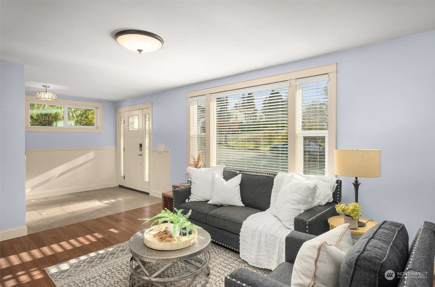 2914 Northeast 6th Street Renton, WA 98056 - Photo 3 of 35 a living room with furniture and a large window