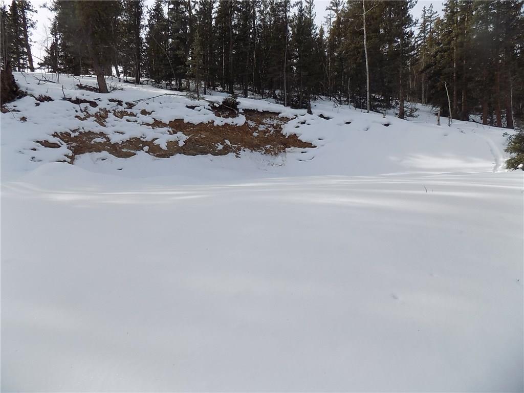 6241 Remington Road Como, CO 80432 - Photo 3 of 15 a view of a snow on the side of a road