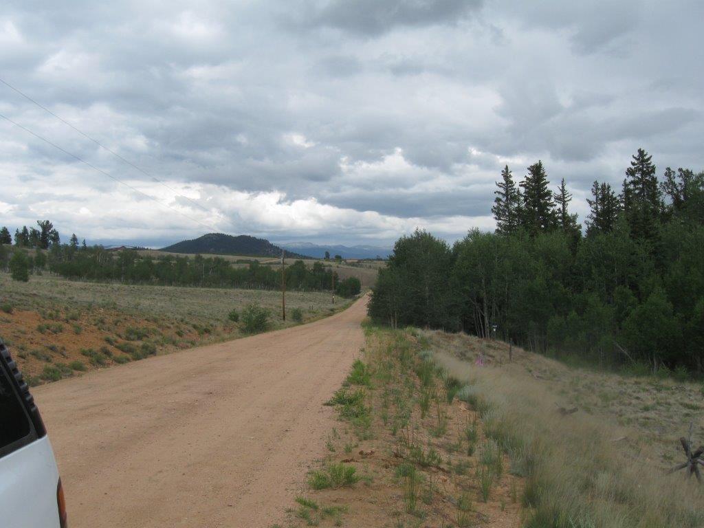 6241 Remington Road Como, CO 80432 - Photo 10 of 15 a view of a lake with a big yard