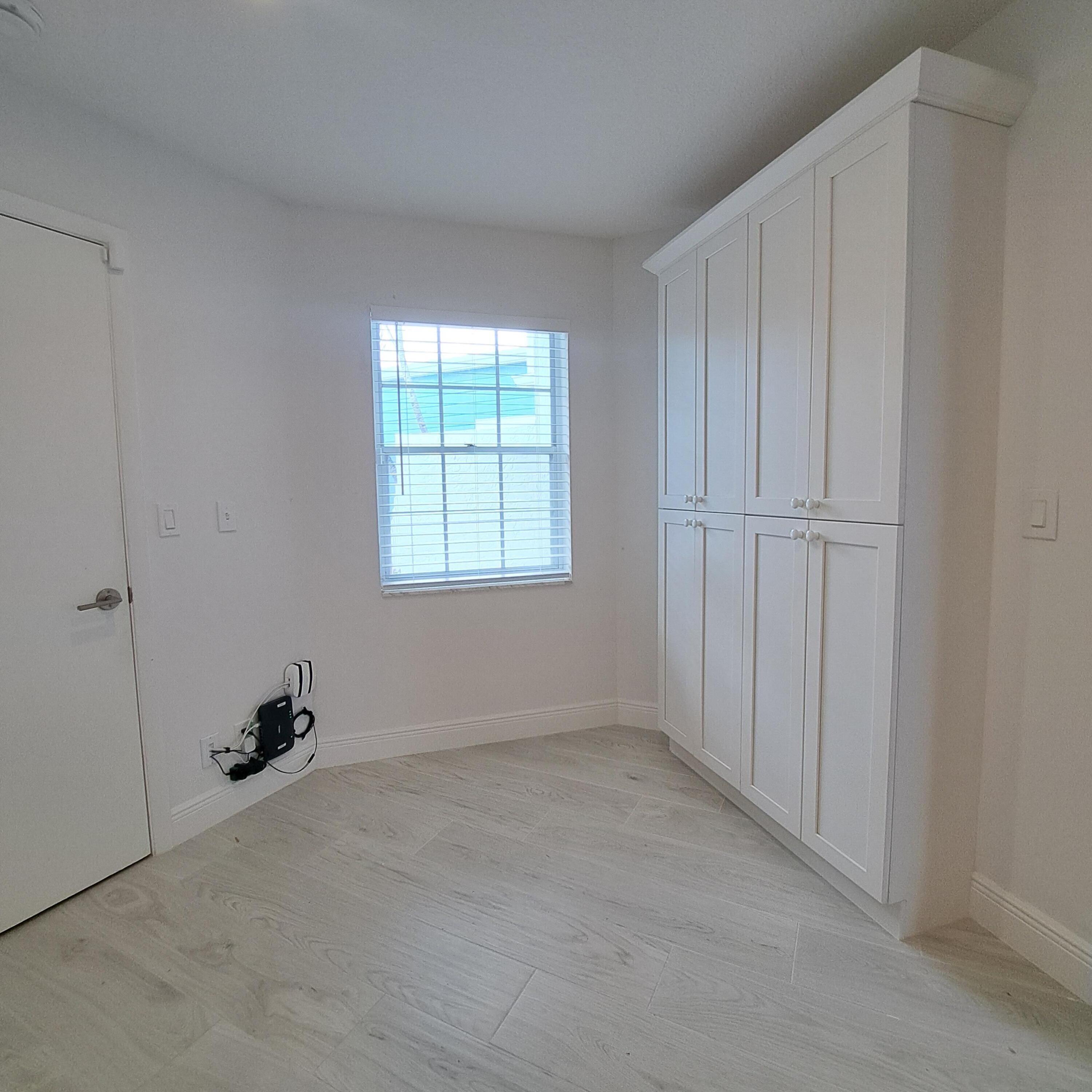 904 Ocean Dunes Circle Jupiter, FL 33477 - Photo 12 of 49 an empty room with windows