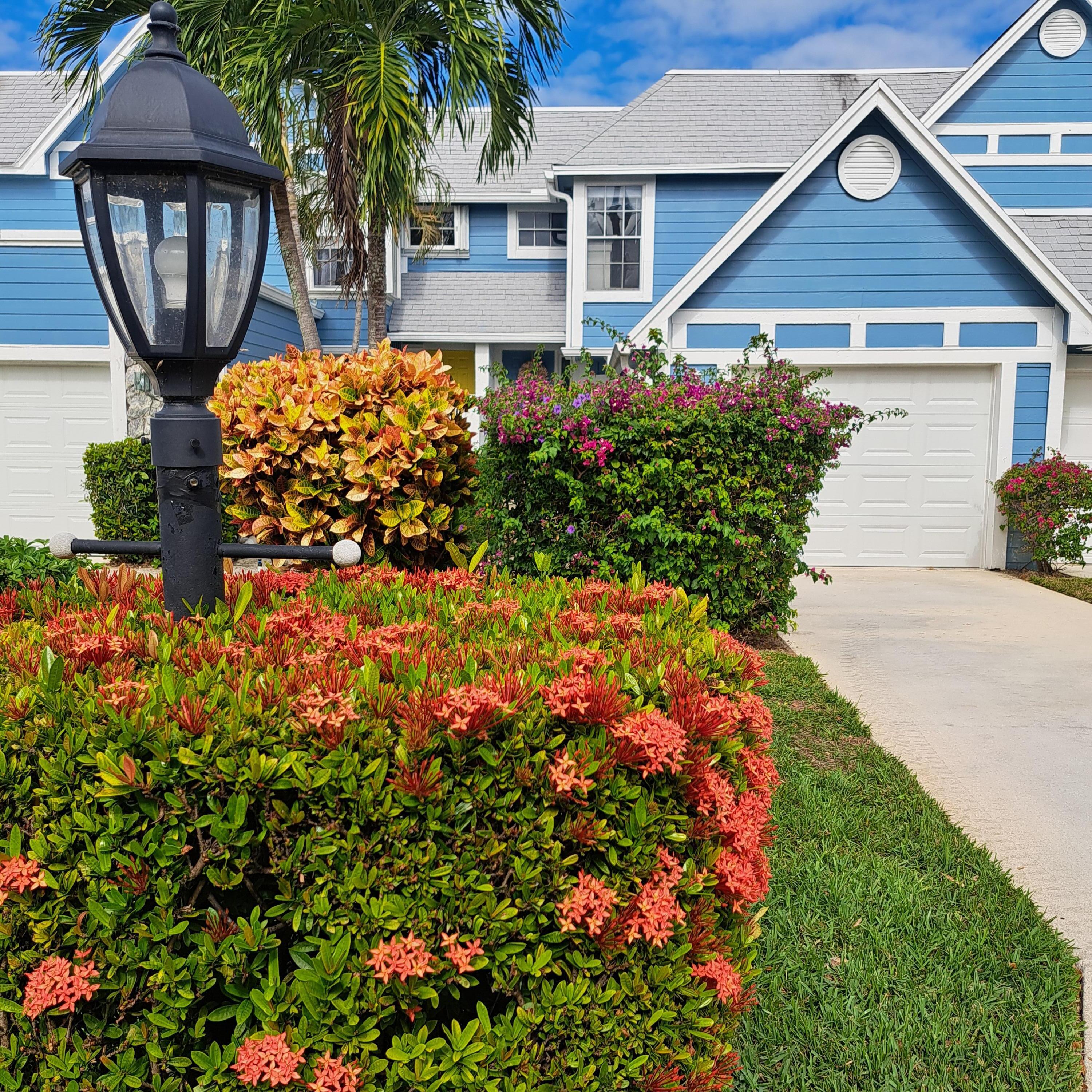 904 Ocean Dunes Circle Jupiter, FL 33477 - Photo 2 of 49 front view of a house
