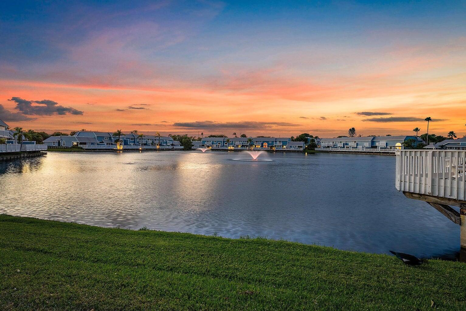 904 Ocean Dunes Circle Jupiter, FL 33477 - Photo 31 of 49 a view of a lake with a city