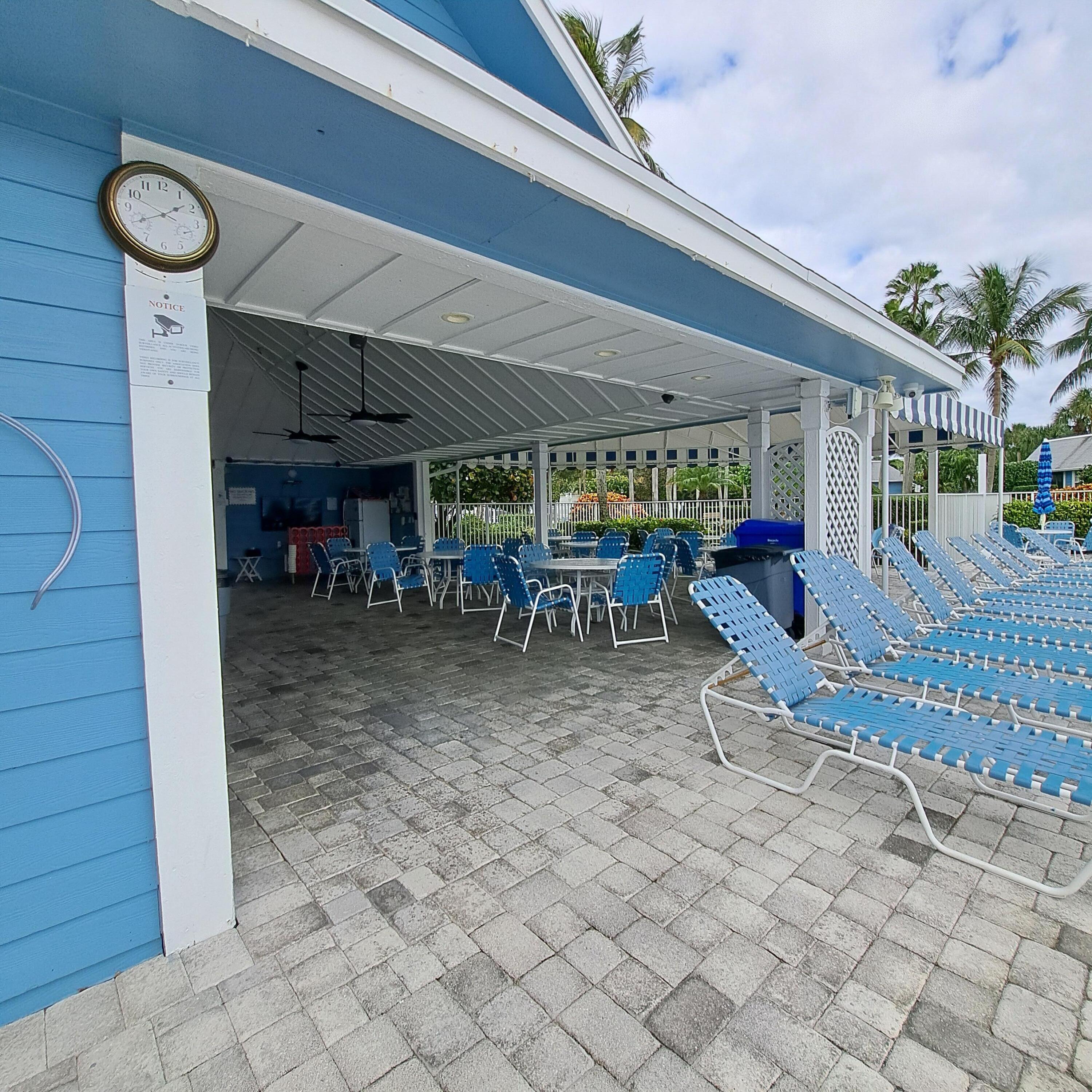 904 Ocean Dunes Circle Jupiter, FL 33477 - Photo 38 of 49 a view of a porch with furniture