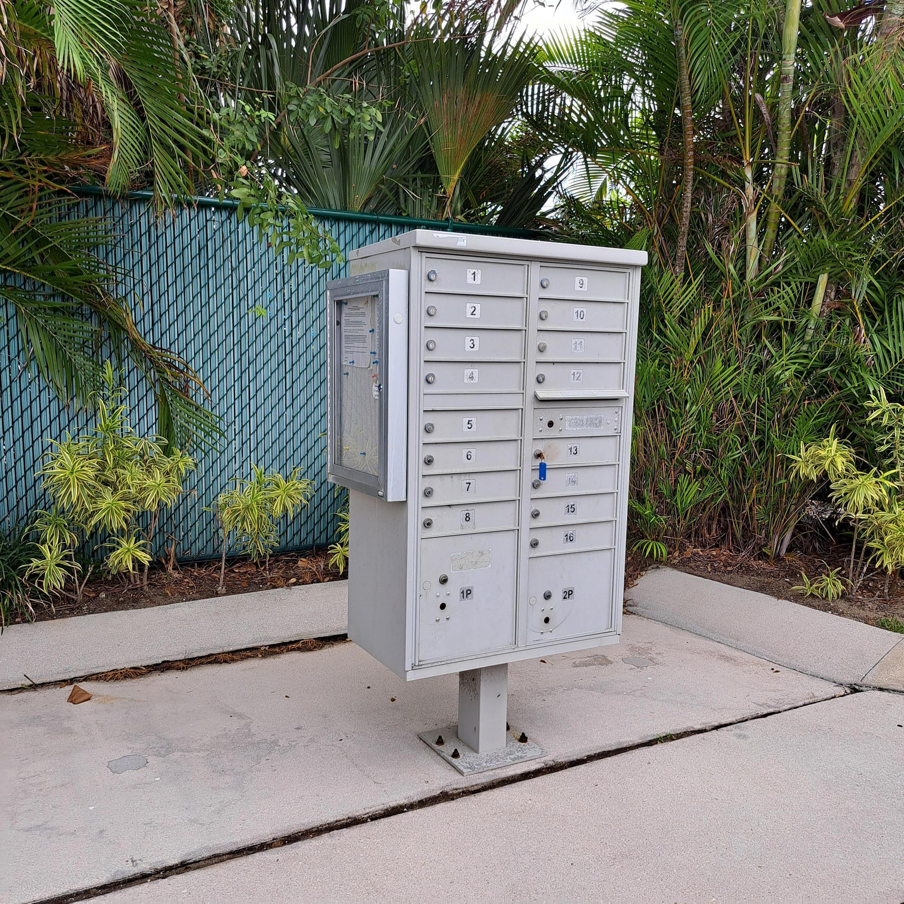904 Ocean Dunes Circle Jupiter, FL 33477 - Photo 41 of 49 a view of a wooden door and a window of the house