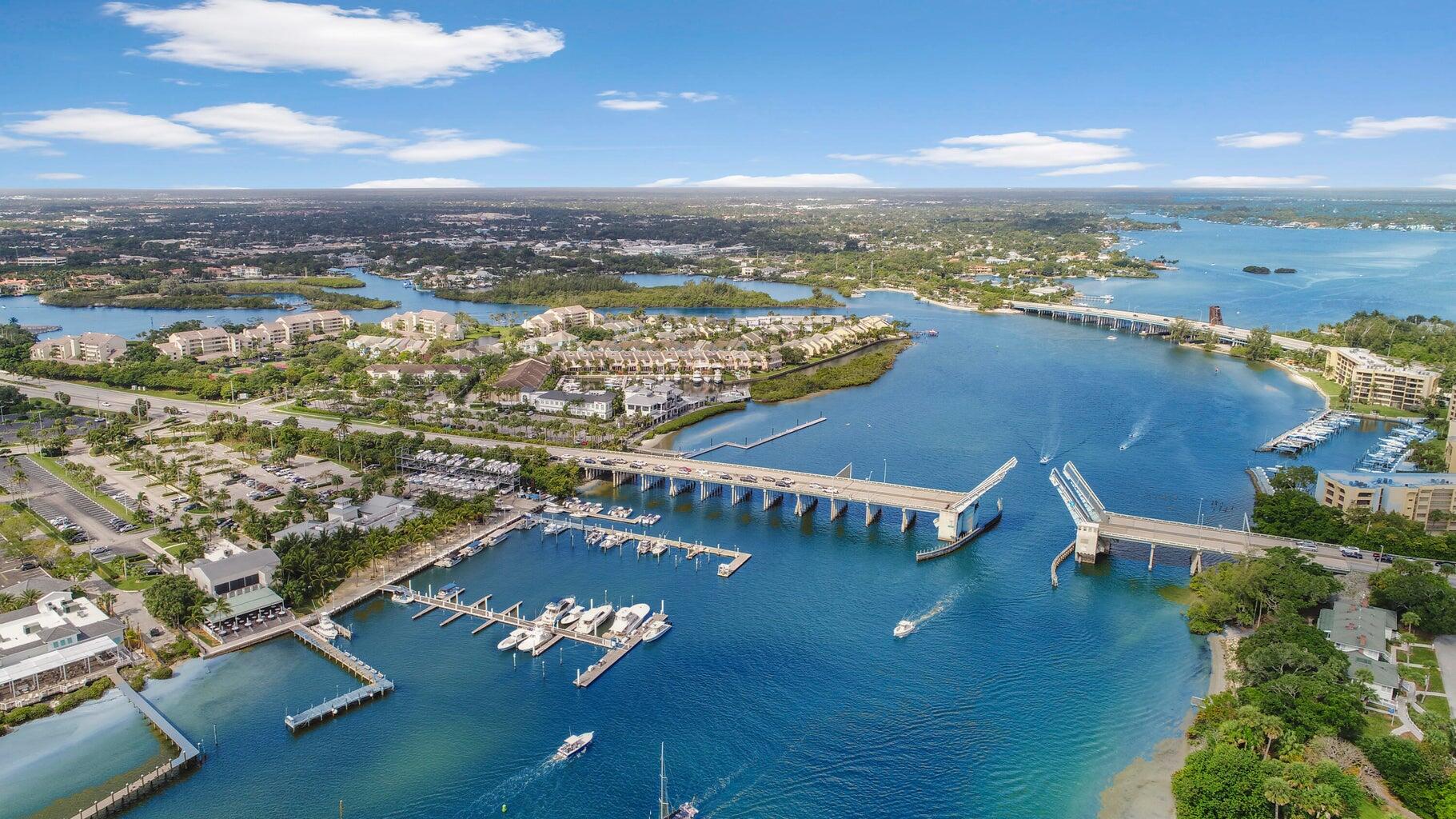 904 Ocean Dunes Circle Jupiter, FL 33477 - Photo 46 of 49 an aerial view of residential houses with outdoor space