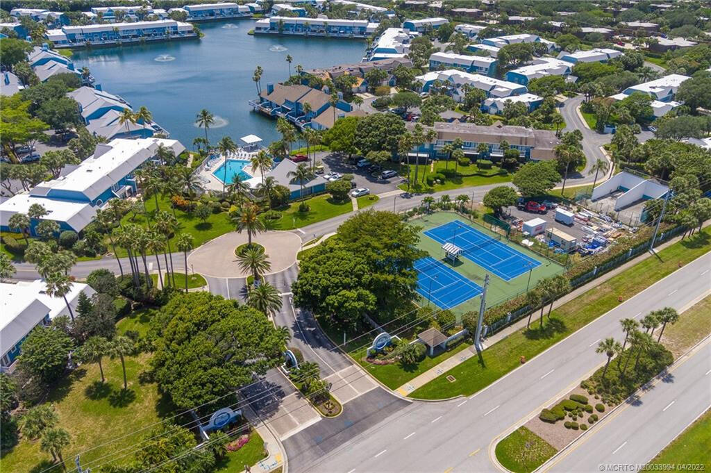 904 Ocean Dunes Circle Jupiter, FL 33477 - Photo 49 of 49 a view of a lake with outdoor space