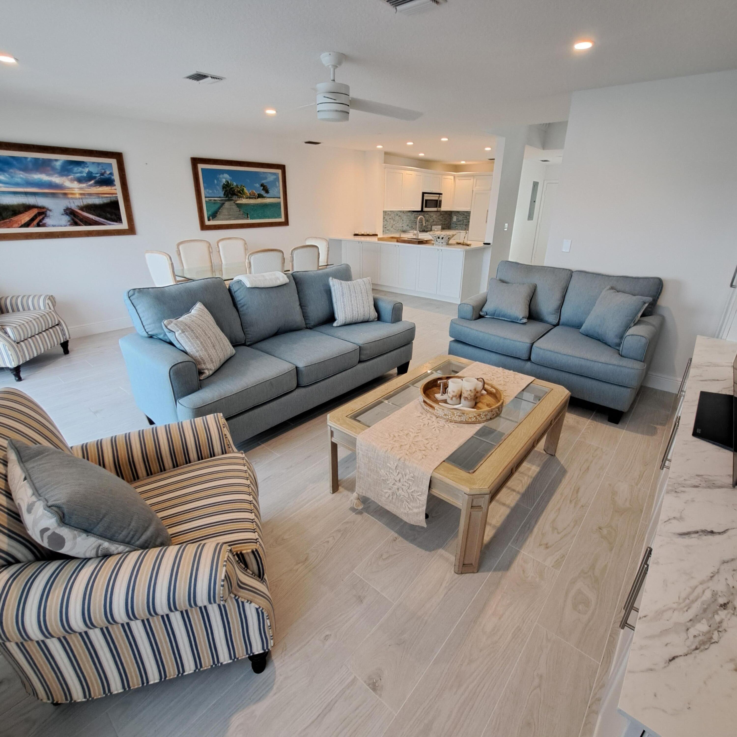 904 Ocean Dunes Circle Jupiter, FL 33477 - Photo 7 of 49 a living room with furniture