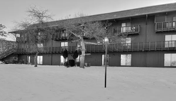 a view of a house with a snow