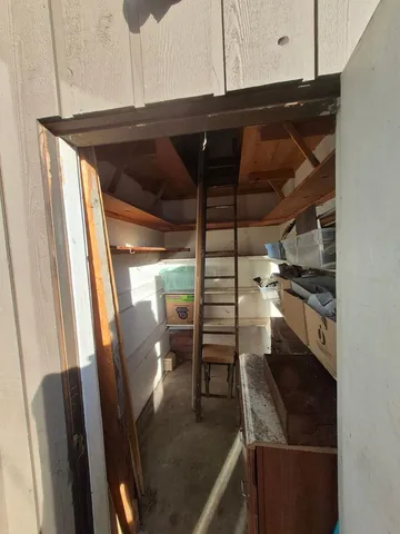 a view of storage and utility room