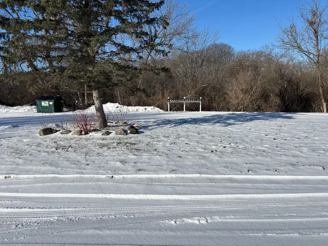 a view of a backyard of a house