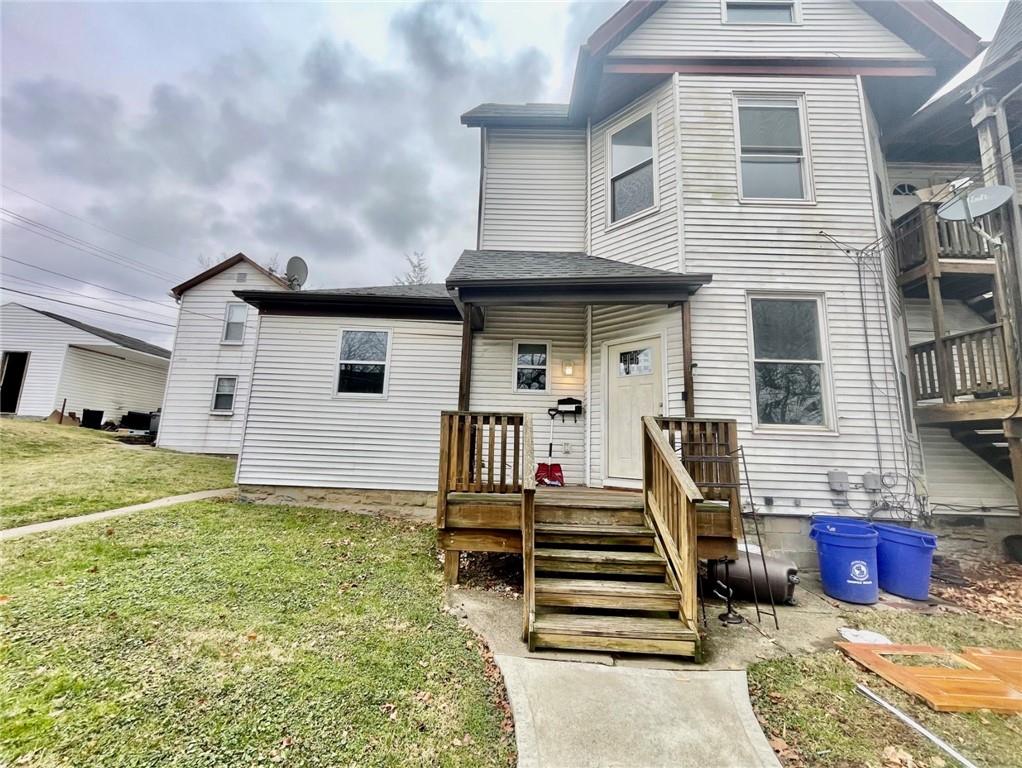 1726 Ridge Avenue Coraopolis, PA 15108 - Photo 14 of 41 a view of a house with wooden floor and a large window