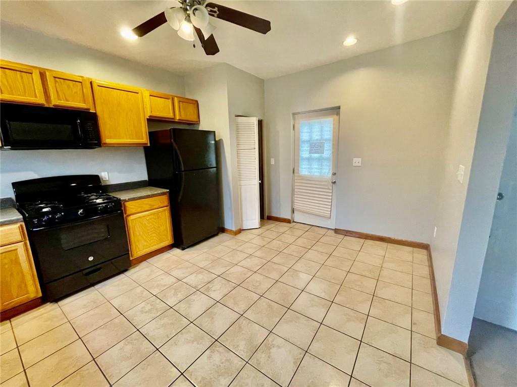 1726 Ridge Avenue Coraopolis, PA 15108 - Photo 15 of 41 a bedroom with a bed and cabinets