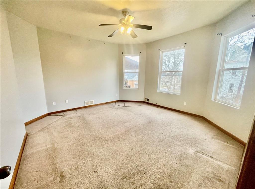 1726 Ridge Avenue Coraopolis, PA 15108 - Photo 22 of 41 a view of an empty room with a window