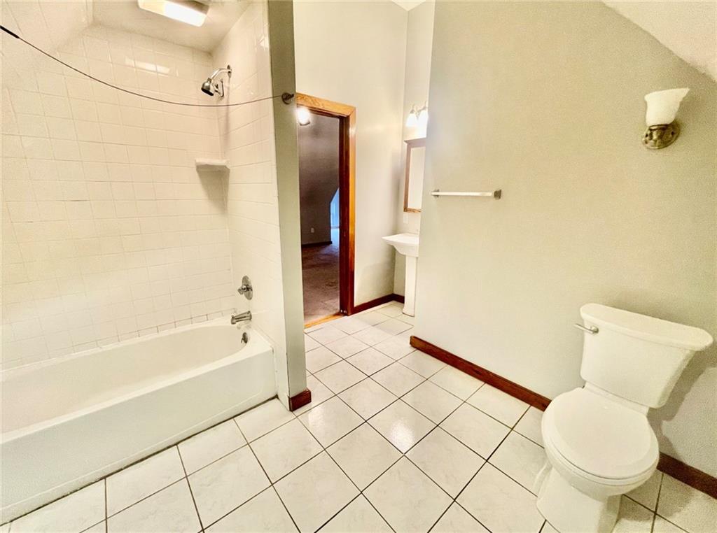 1726 Ridge Avenue Coraopolis, PA 15108 - Photo 31 of 41 a bathroom with a bathtub and a toilet