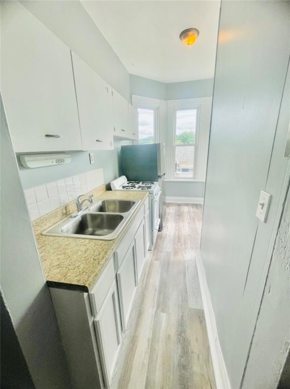 1726 Ridge Avenue Coraopolis, PA 15108 - Photo 36 of 41 a kitchen that has a sink in it