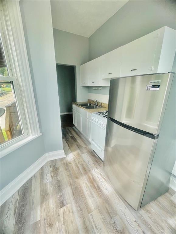 1726 Ridge Avenue Coraopolis, PA 15108 - Photo 37 of 41 a kitchen with a refrigerator and a stove