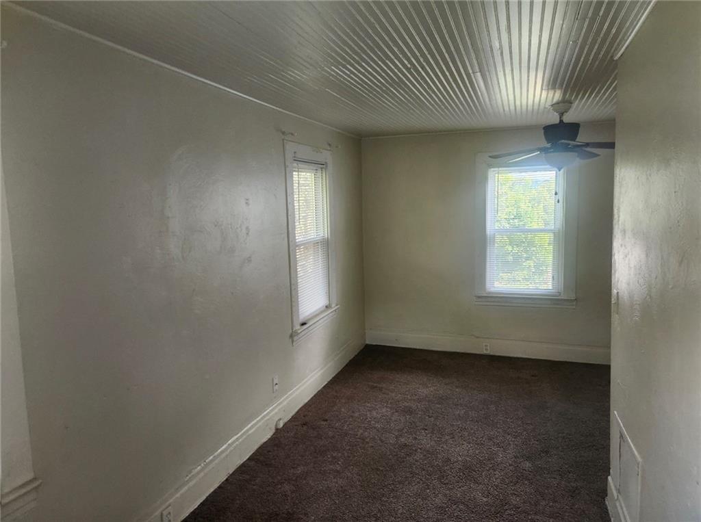 1726 Ridge Avenue Coraopolis, PA 15108 - Photo 7 of 41 an empty room with windows