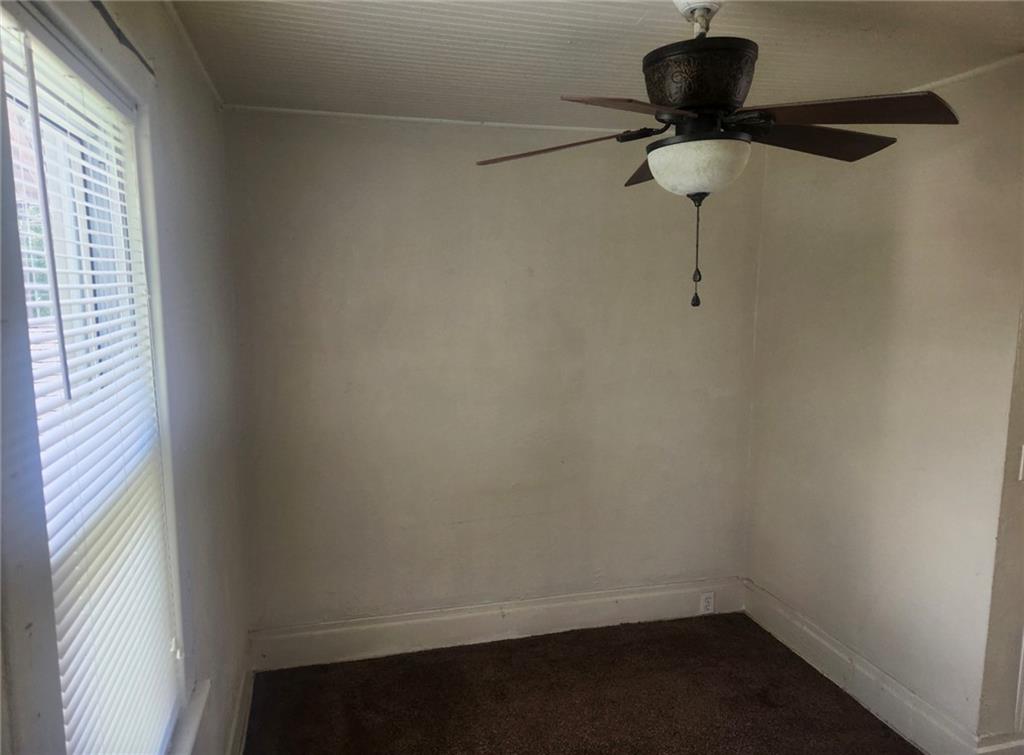 1726 Ridge Avenue Coraopolis, PA 15108 - Photo 9 of 41 a small space with a window and a fan