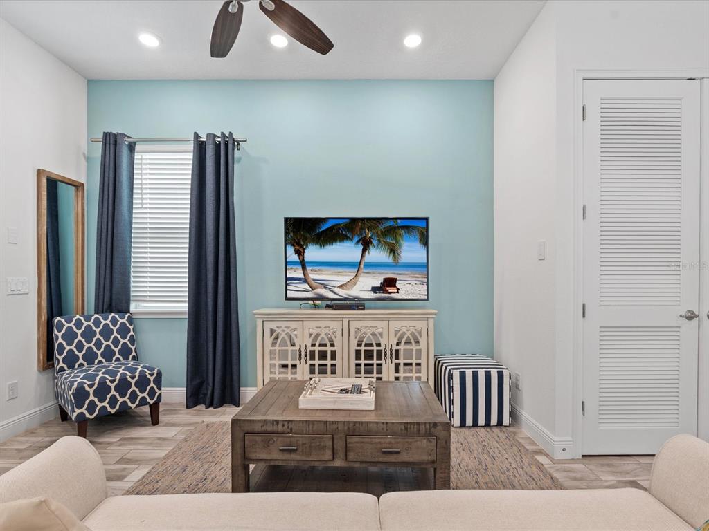 8092 Knee Deep Road Kissimmee, FL 34747 - Photo 5 of 26 a living room with furniture