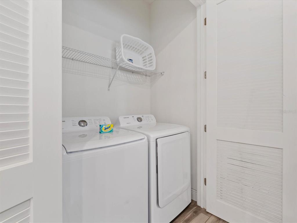 8092 Knee Deep Road Kissimmee, FL 34747 - Photo 10 of 26 a utility room with dryer and washer