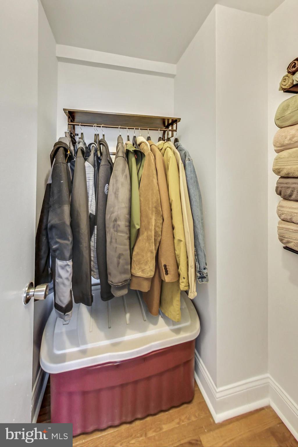 1451 Park Road Northwest, Unit 303 Washington, DC 20010 - Photo 17 of 27 a view of walk in closet with clothes and shoes