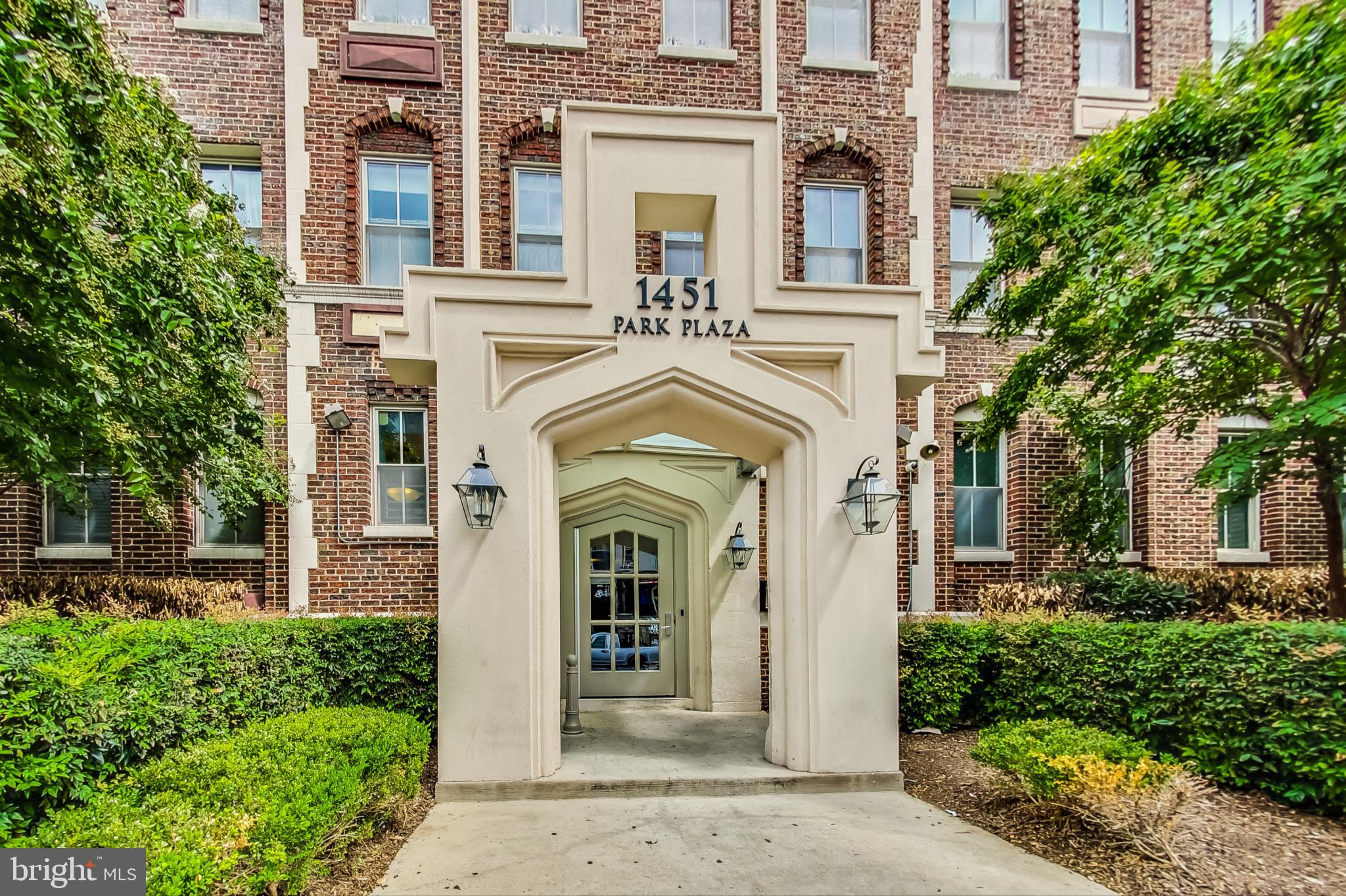 1451 Park Road Northwest, Unit 303 Washington, DC 20010 - Photo 2 of 27 front view of a house with a view of a building