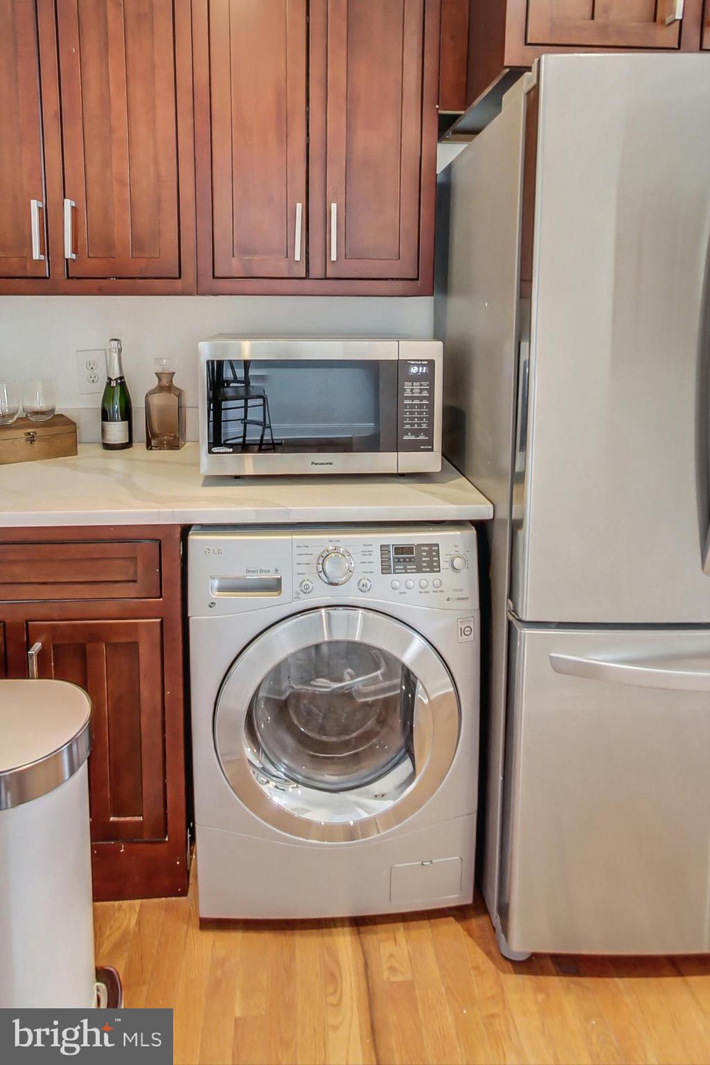 1451 Park Road Northwest, Unit 303 Washington, DC 20010 - Photo 10 of 27 a utility room with dryer and washer