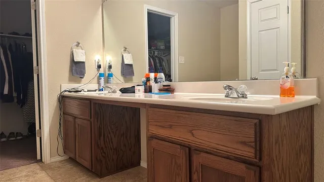 a bedroom with furniture and a bed