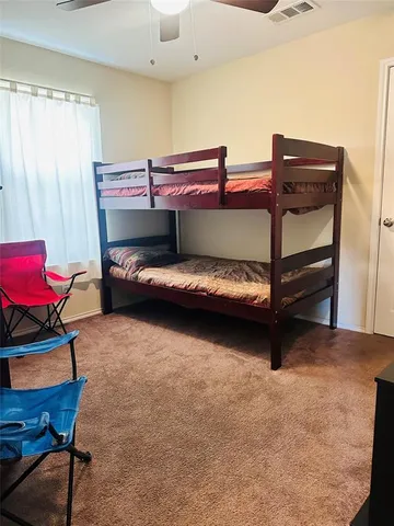 a view of a backyard of a house