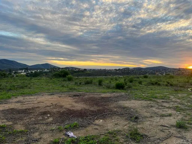 a view of a field with beach