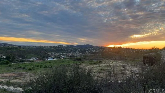a view of a mountain from a yard