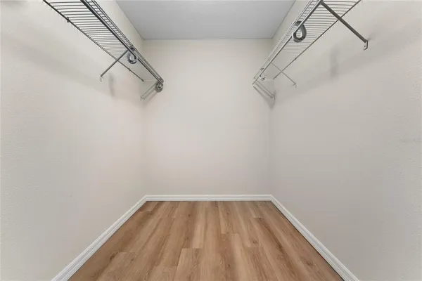 a view of a room with racks on the wall